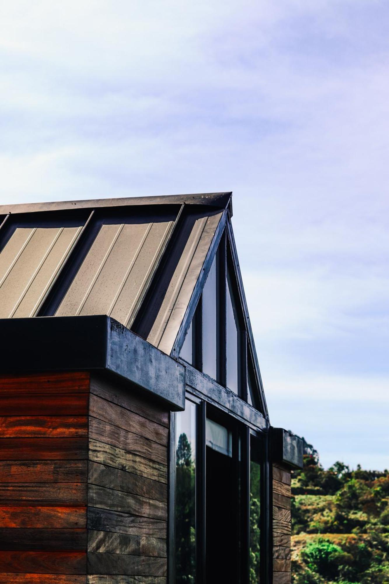 The Boato Hotel Guatape Exterior photo Standing seam metal roofing